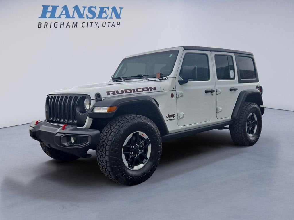 2022 Jeep Wrangler Unlimited Rubicon in White — front three-quarter view