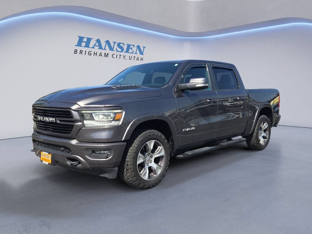 2021 RAM 1500 Laramie in Grey — front three-quarter view