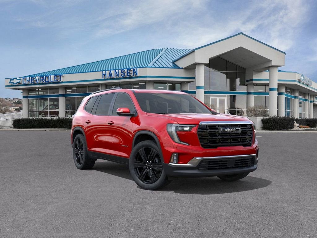 2026 GMC Acadia Elevation in Volcanic Red Tintcoat — front three-quarter view