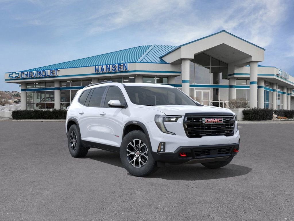 2026 GMC Acadia AT4 in Glacier White Tricoat — front three-quarter view