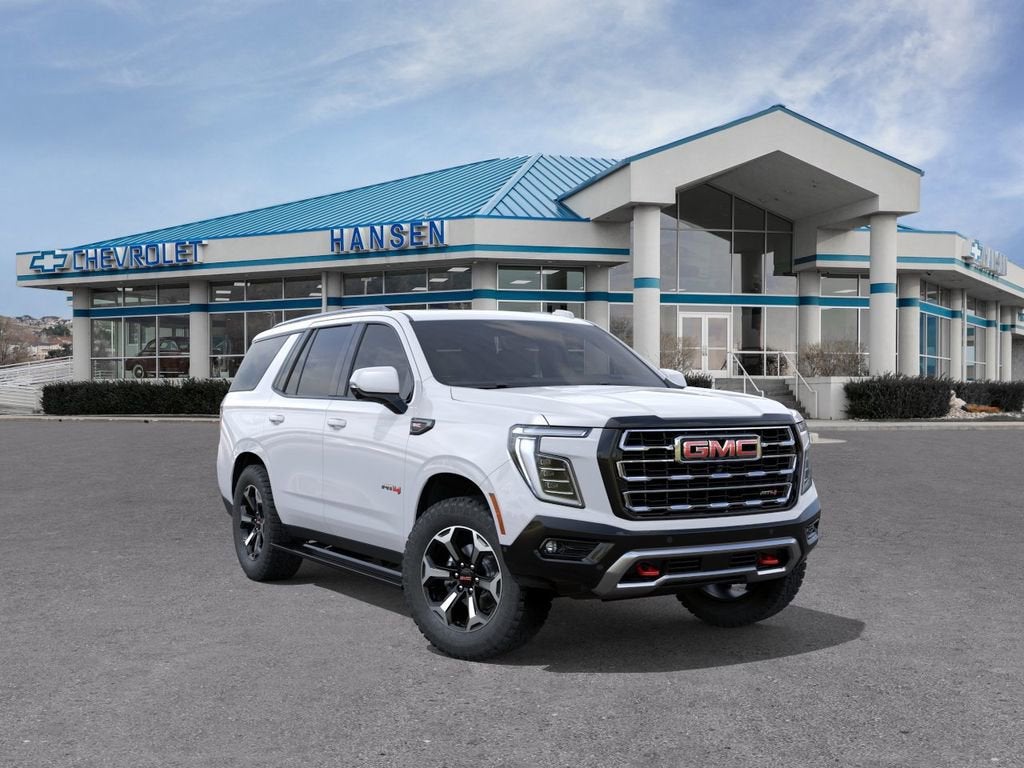 2026 GMC Yukon AT4 in Summit White — front three-quarter view