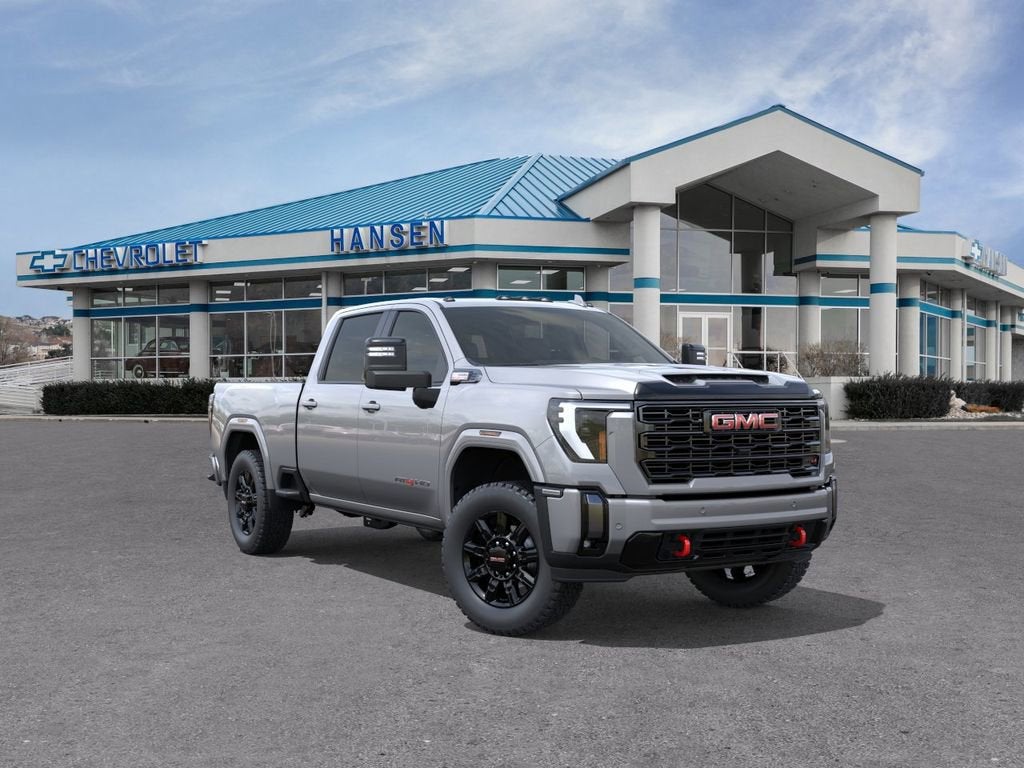 2026 GMC Sierra 3500 HD AT4 in Sterling Metallic — front three-quarter view
