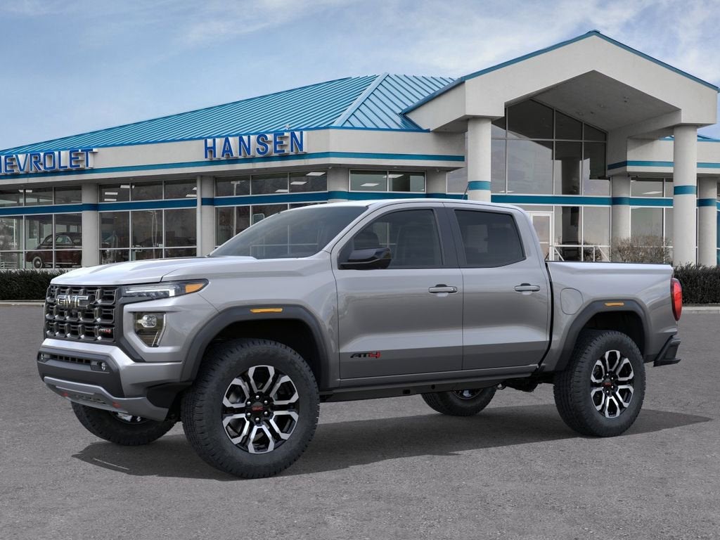 2026 GMC Canyon AT4 in Sterling Metallic — front three-quarter view
