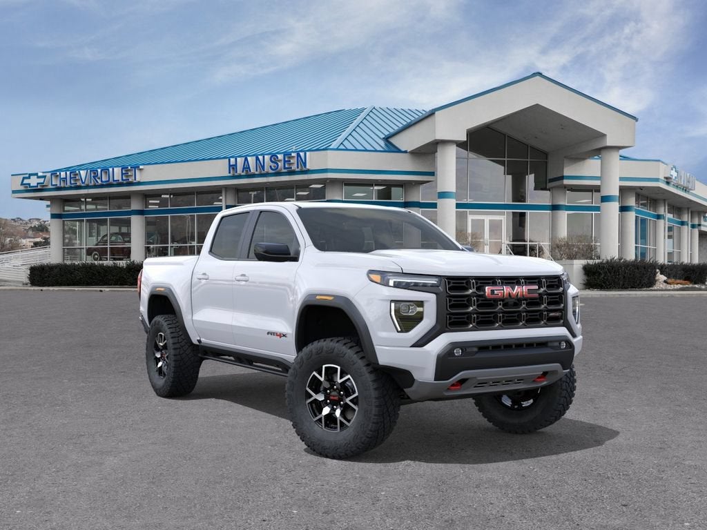 2026 GMC Canyon AT4X in Summit White — front three-quarter view