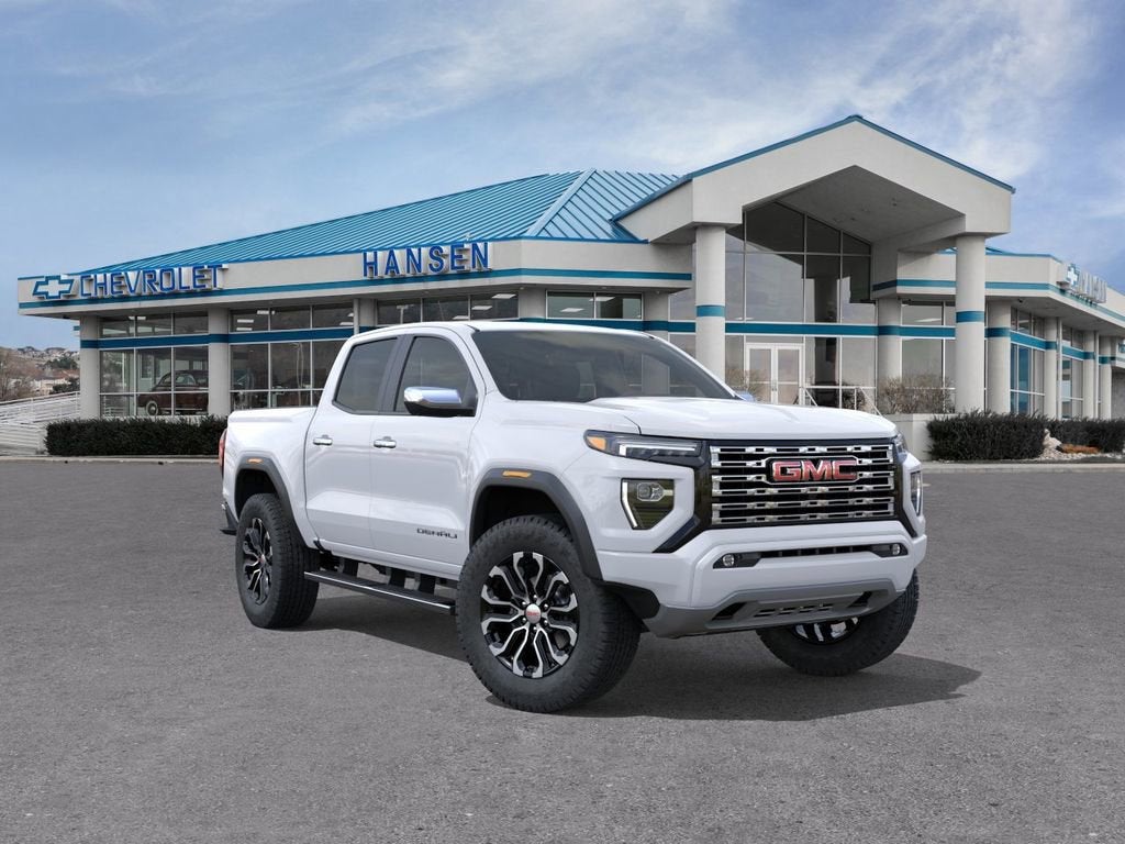 2026 GMC Canyon Denali in Summit White — front three-quarter view