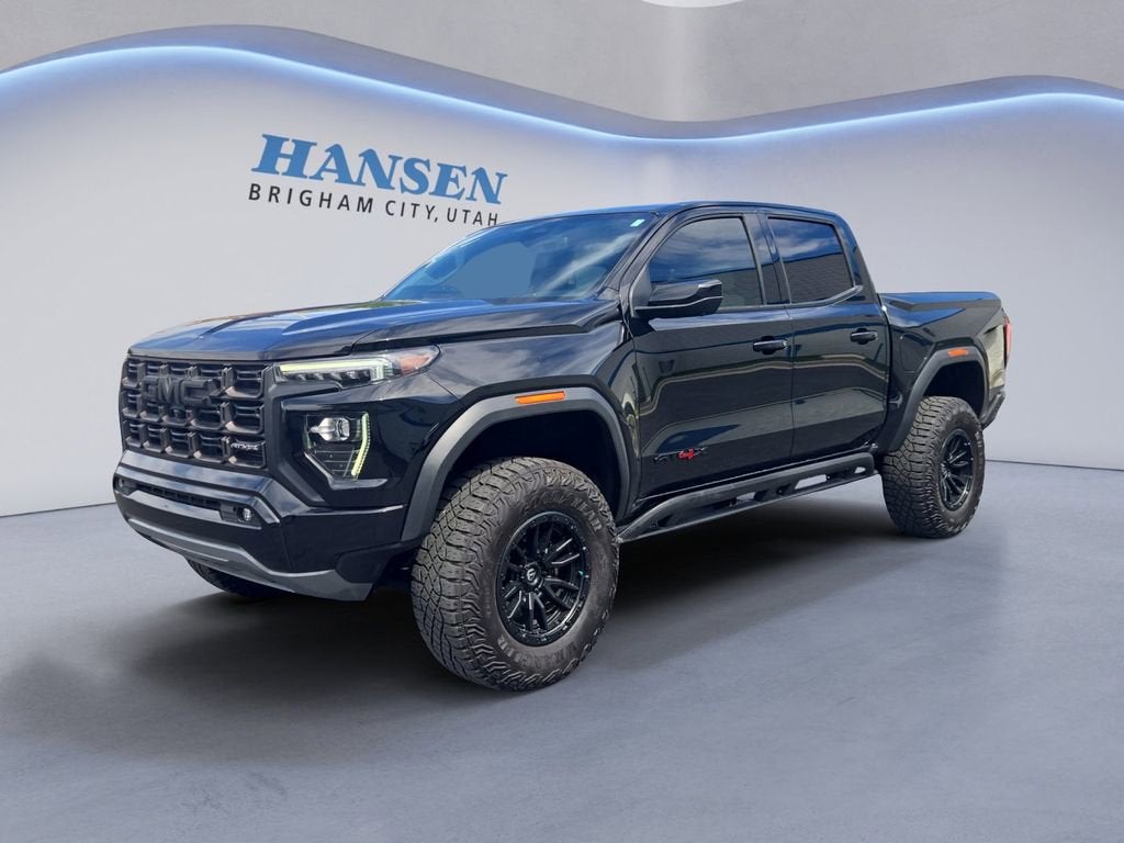 2023 GMC Canyon AT4X in Onyx Black — front three-quarter view