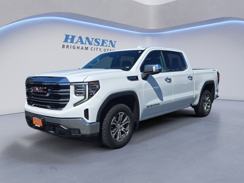 2025 GMC Sierra 1500 SLT in Summit White — front three-quarter view