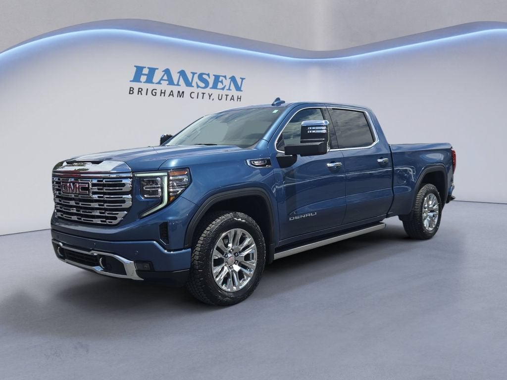 2025 GMC Sierra 1500 Denali in Downpour Metallic — front three-quarter view