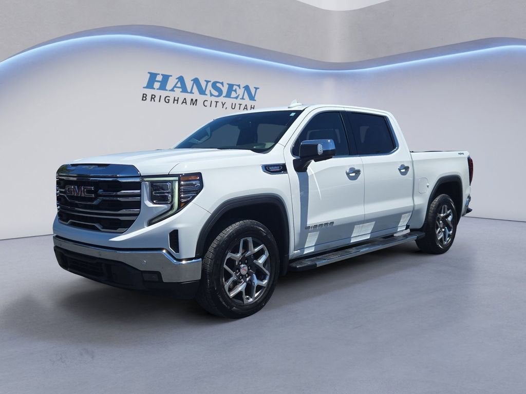 2024 GMC Sierra 1500 SLT in Summit White — front three-quarter view