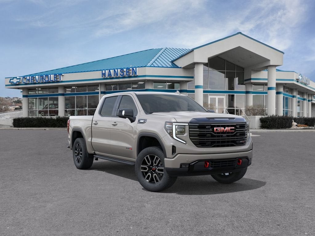 2026 GMC Sierra 1500 AT4 in Coastal Dune — front three-quarter view