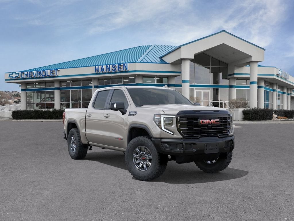 2026 GMC Sierra 1500 AT4X in Coastal Dune — front three-quarter view