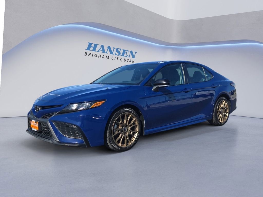2024 Toyota Camry SE in Blue — front three-quarter view